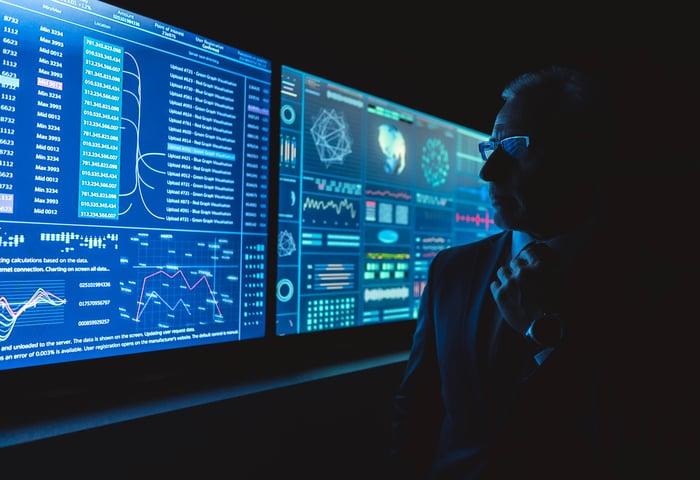 man-analyzes-data-on-a-futuristic-screen-2026-01-06-09-24-54-utc (1)